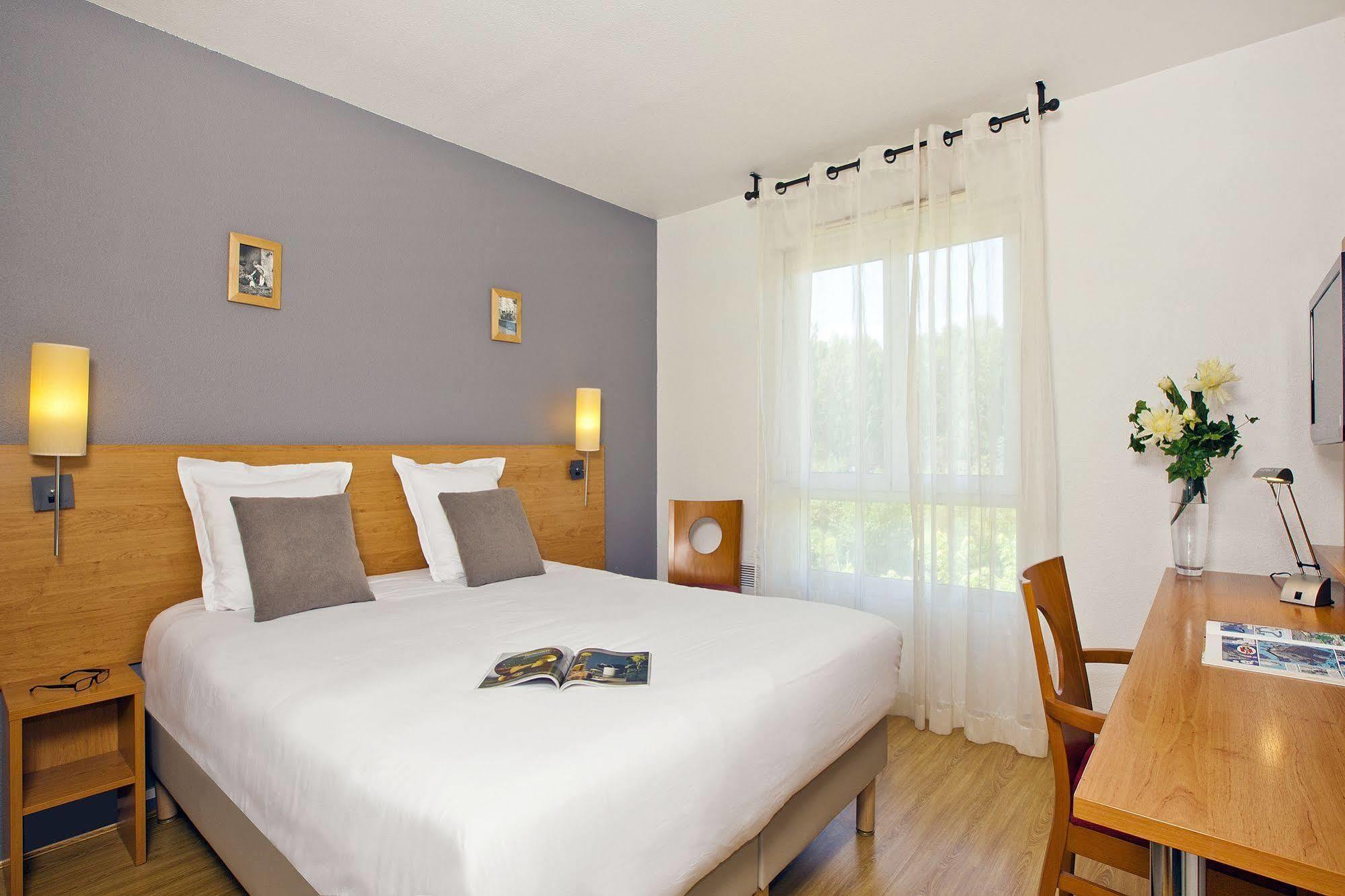 Sejours & Affaires Annecy Le Pont Neuf Aparthotel Cran-Gévrier Eksteriør bilde